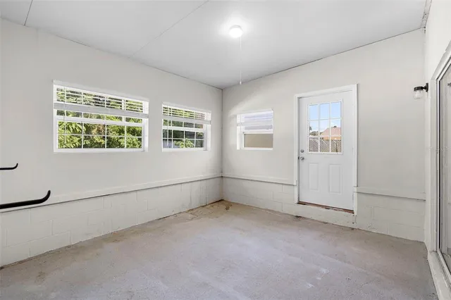 an empty room with windows