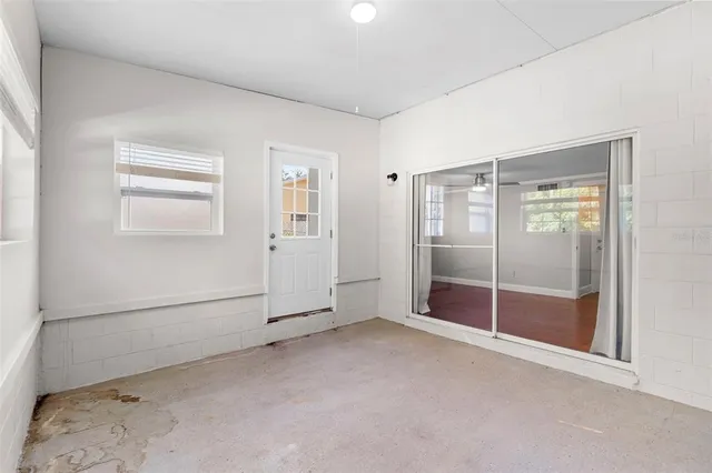 an empty room with windows