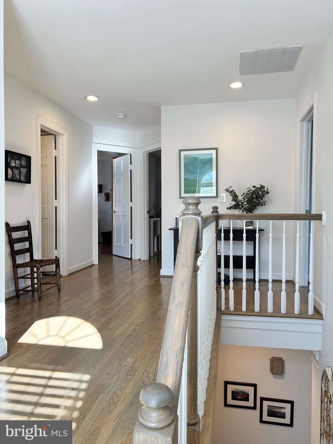 515 Chestertown Street Gaithersburg, MD 20878 - Photo 29 of 50 a living room with furniture and a wooden floor