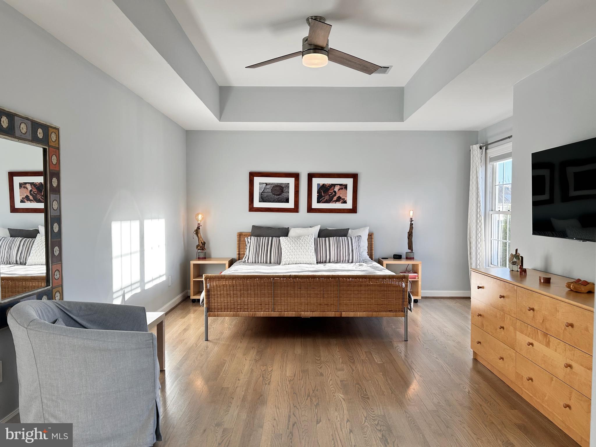 515 Chestertown Street Gaithersburg, MD 20878 - Photo 30 of 50 a living room with furniture and a flat screen tv