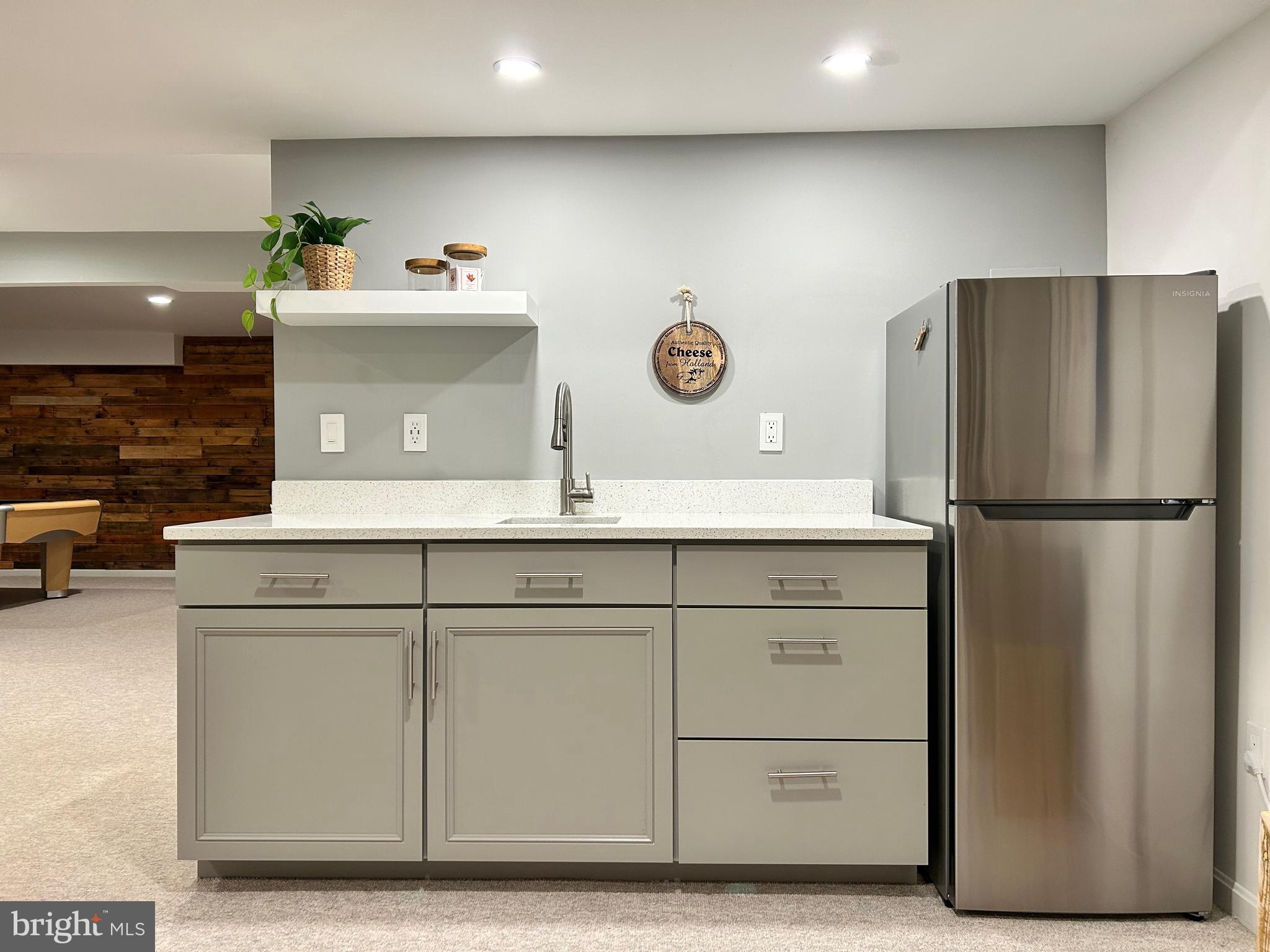 515 Chestertown Street Gaithersburg, MD 20878 - Photo 43 of 50 a kitchen with a refrigerator and a stove