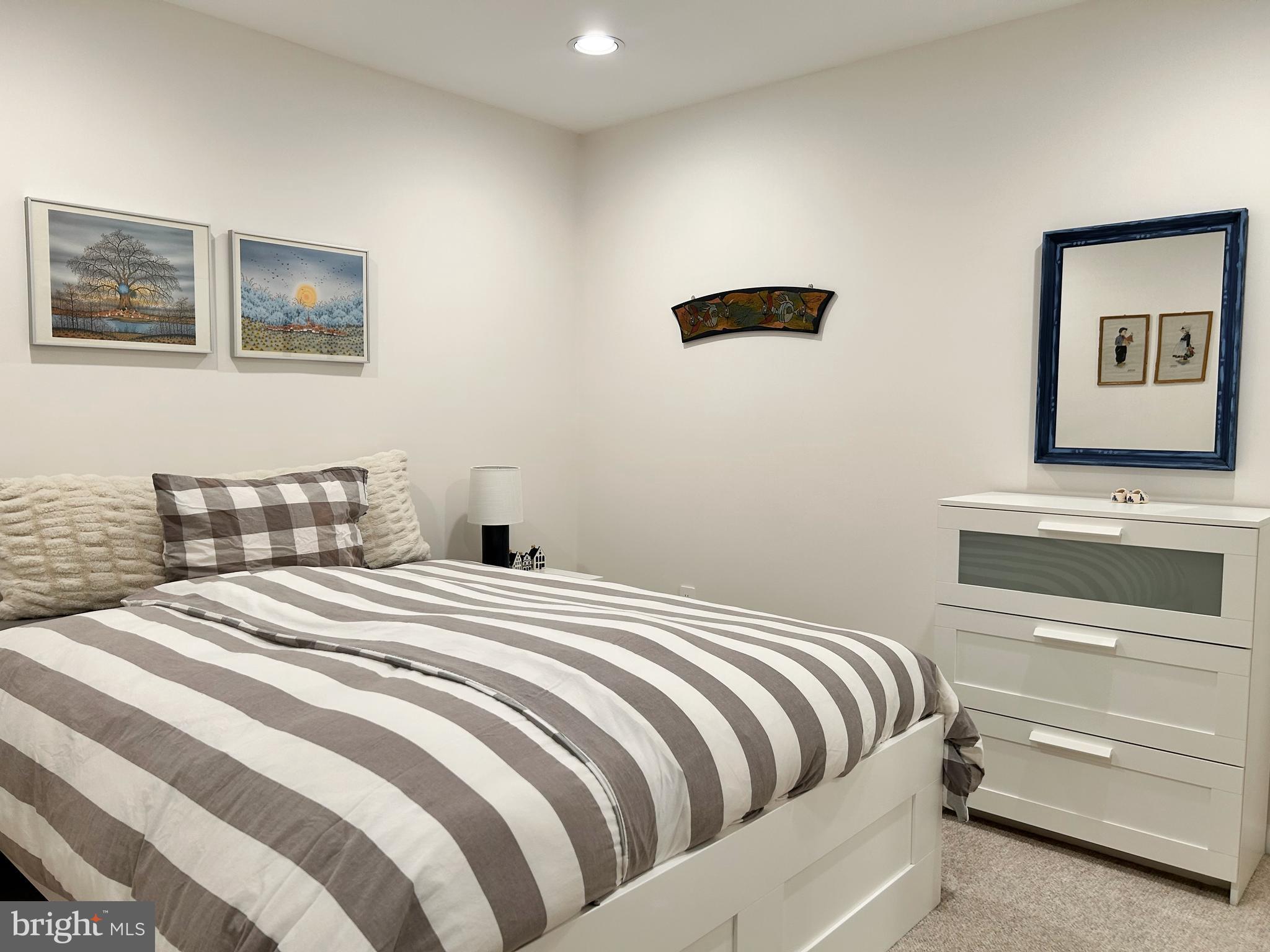 515 Chestertown Street Gaithersburg, MD 20878 - Photo 45 of 50 a bedroom with a bed and cabinet