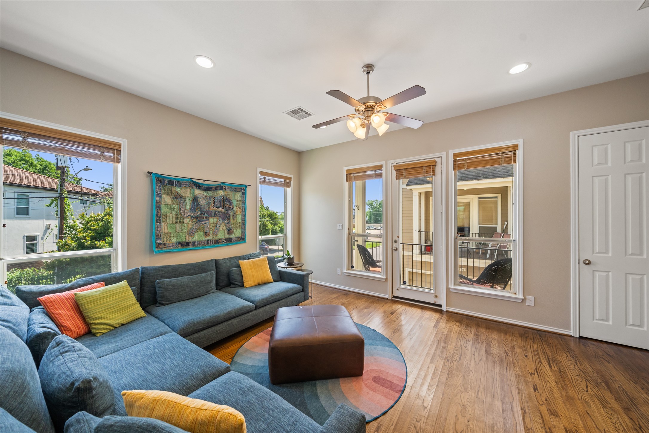 2613 Link Road Houston, TX 77009 - Photo 12 of 28 The second floor showcases the living, dining, and kitchen. The corner positioning of this home features plentiful windows and a surplus of natural light.