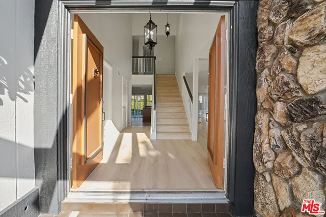 a view of a livingroom with furniture and window