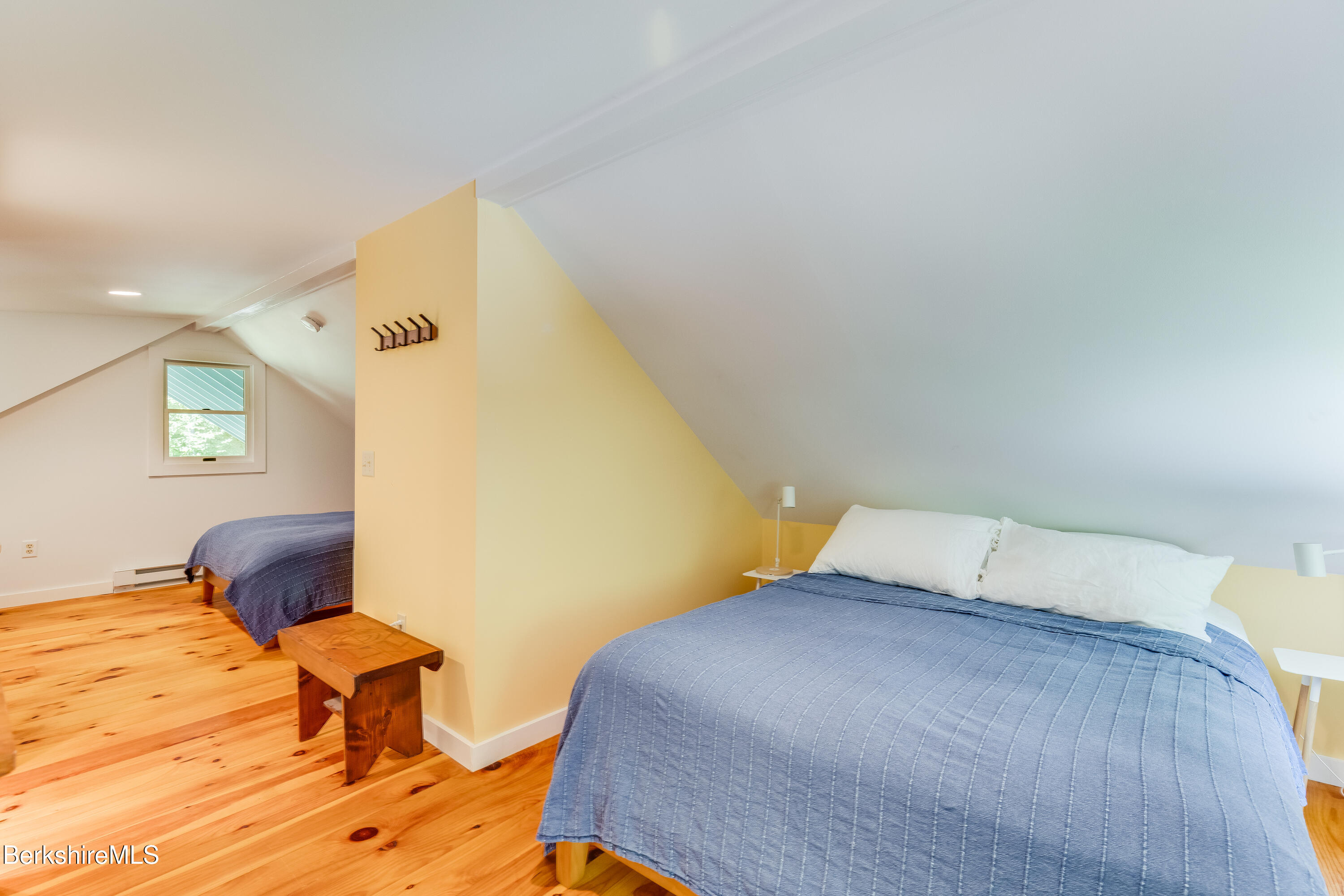 14 Norwalk Acres Road Monterey, MA 01245 - Photo 23 of 56 a bedroom with a bed and wooden floor