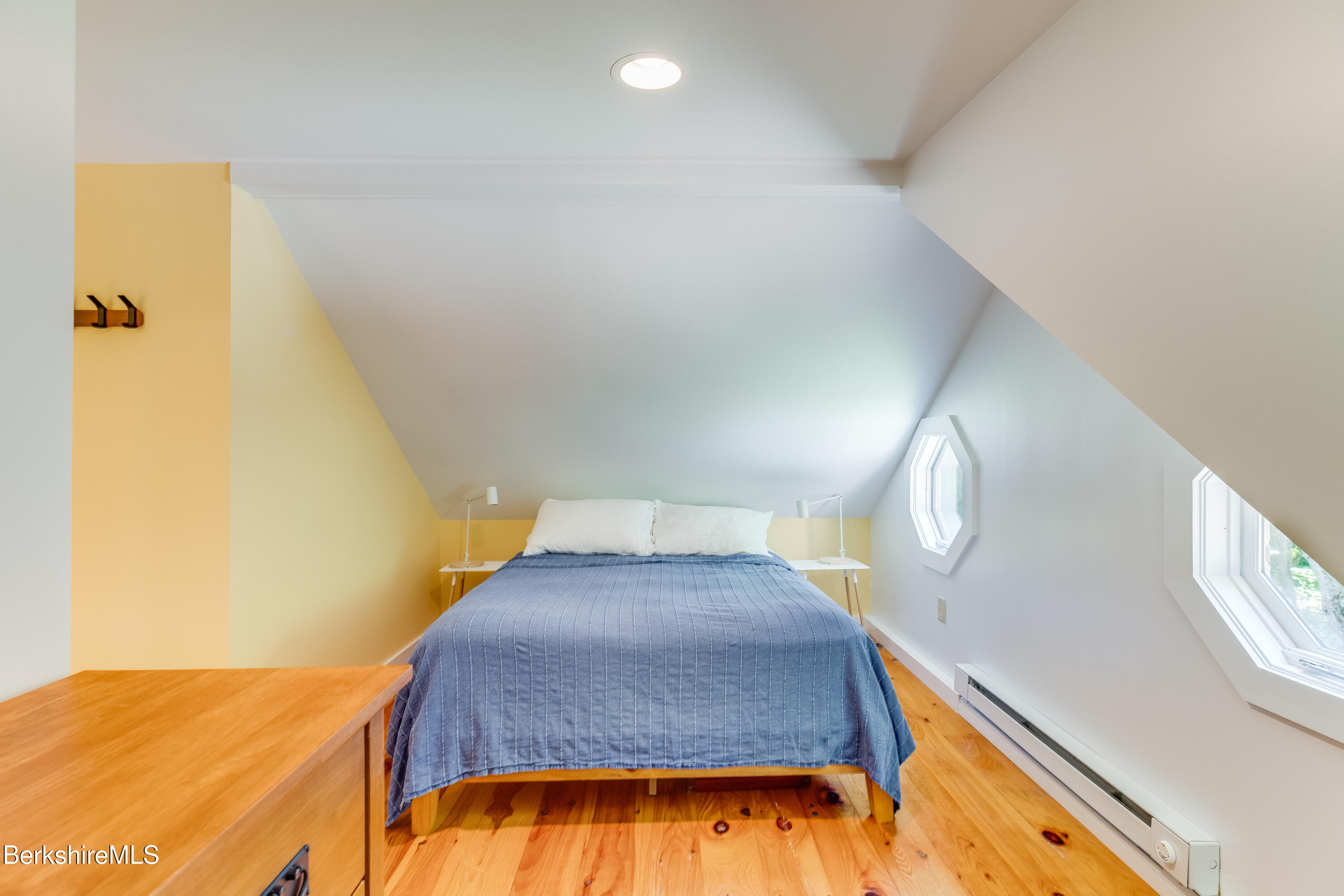 14 Norwalk Acres Road Monterey, MA 01245 - Photo 24 of 56 a bedroom with a bed and wooden floor