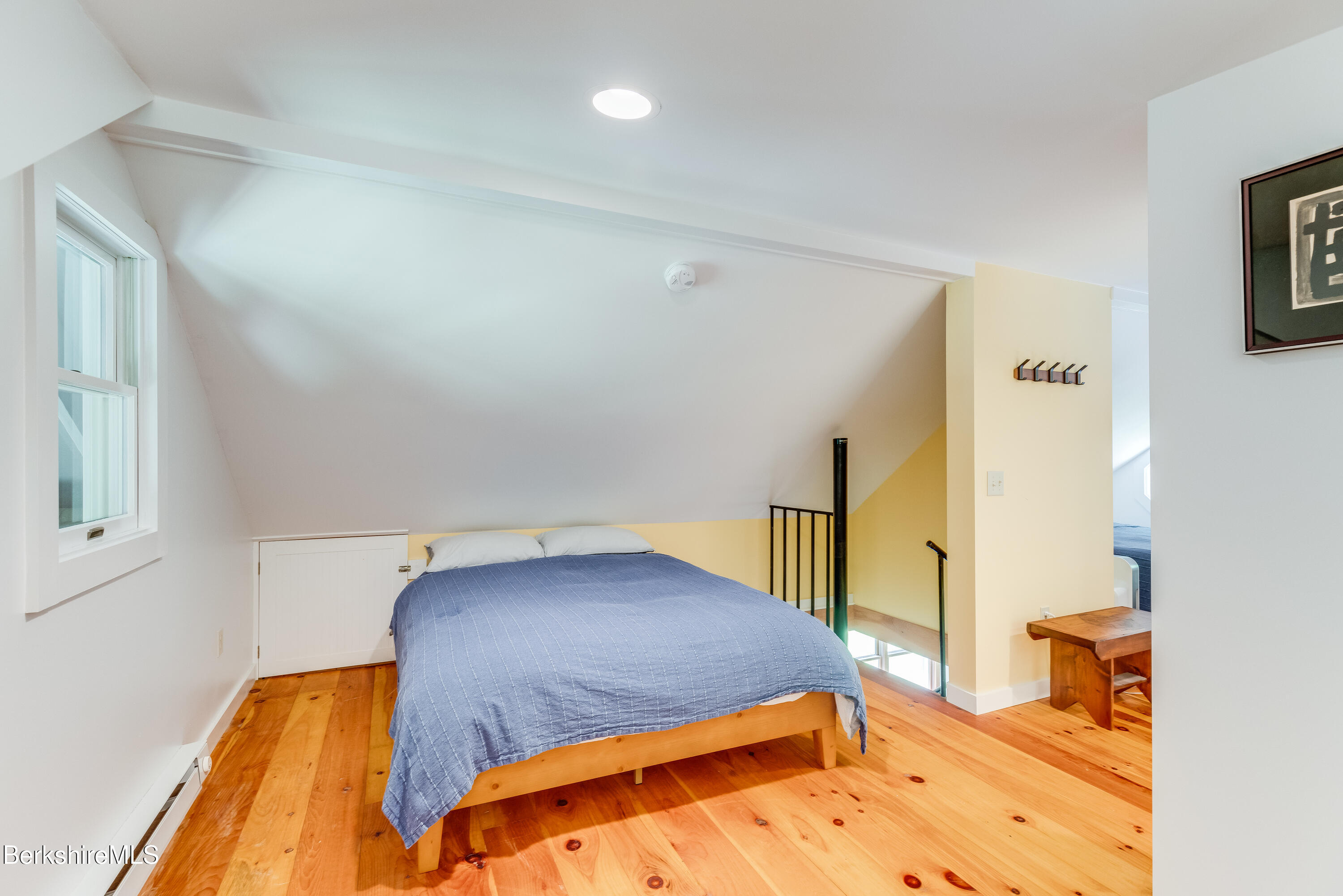 14 Norwalk Acres Road Monterey, MA 01245 - Photo 29 of 56 a bedroom with a bed and a table in it