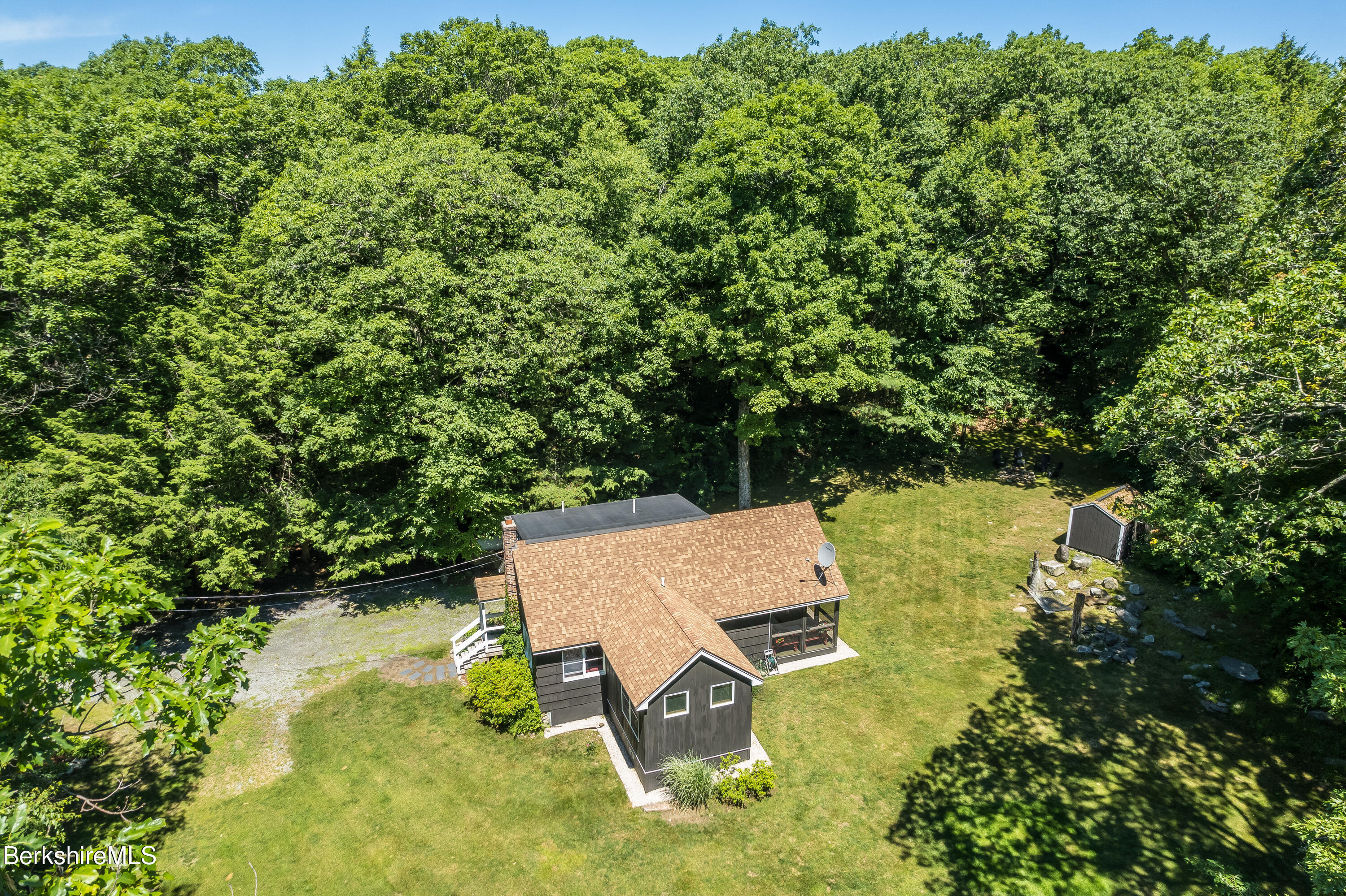 14 Norwalk Acres Road Monterey, MA 01245 - Photo 38 of 56 an aerial view of a house with swimming pool and garden