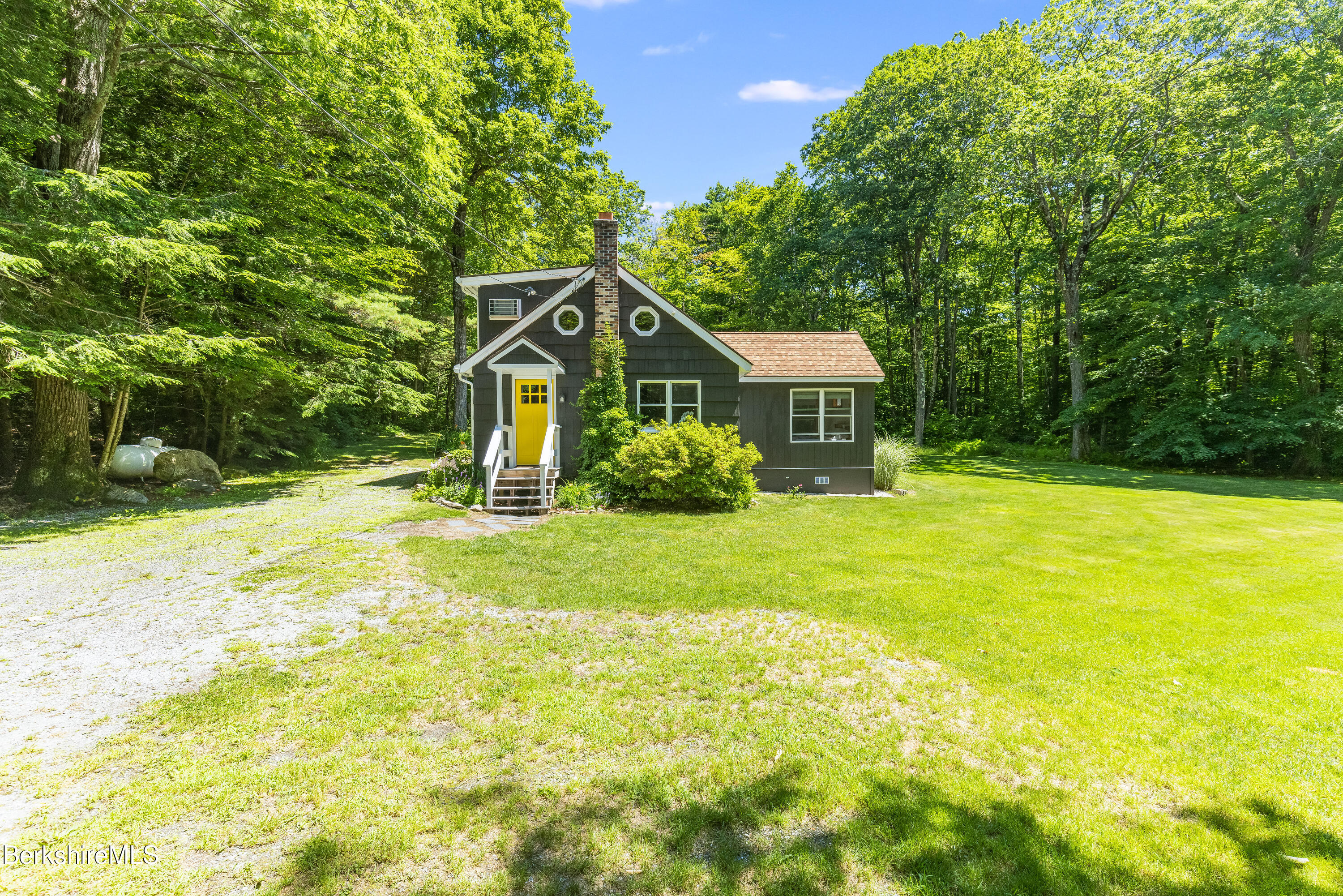 14 Norwalk Acres Road Monterey, MA 01245 - Photo 51 of 56 a front view of a house with a yard