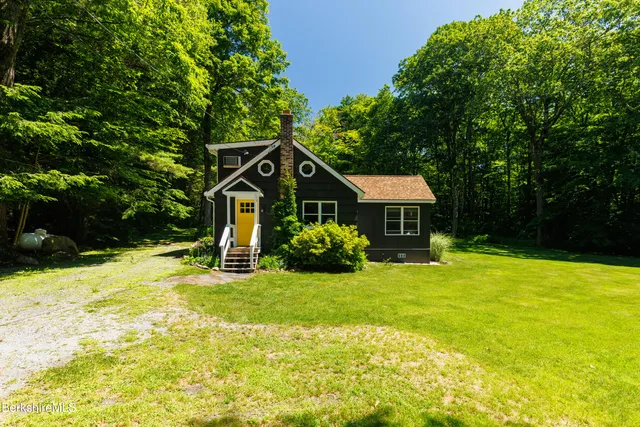 a house view with a garden space