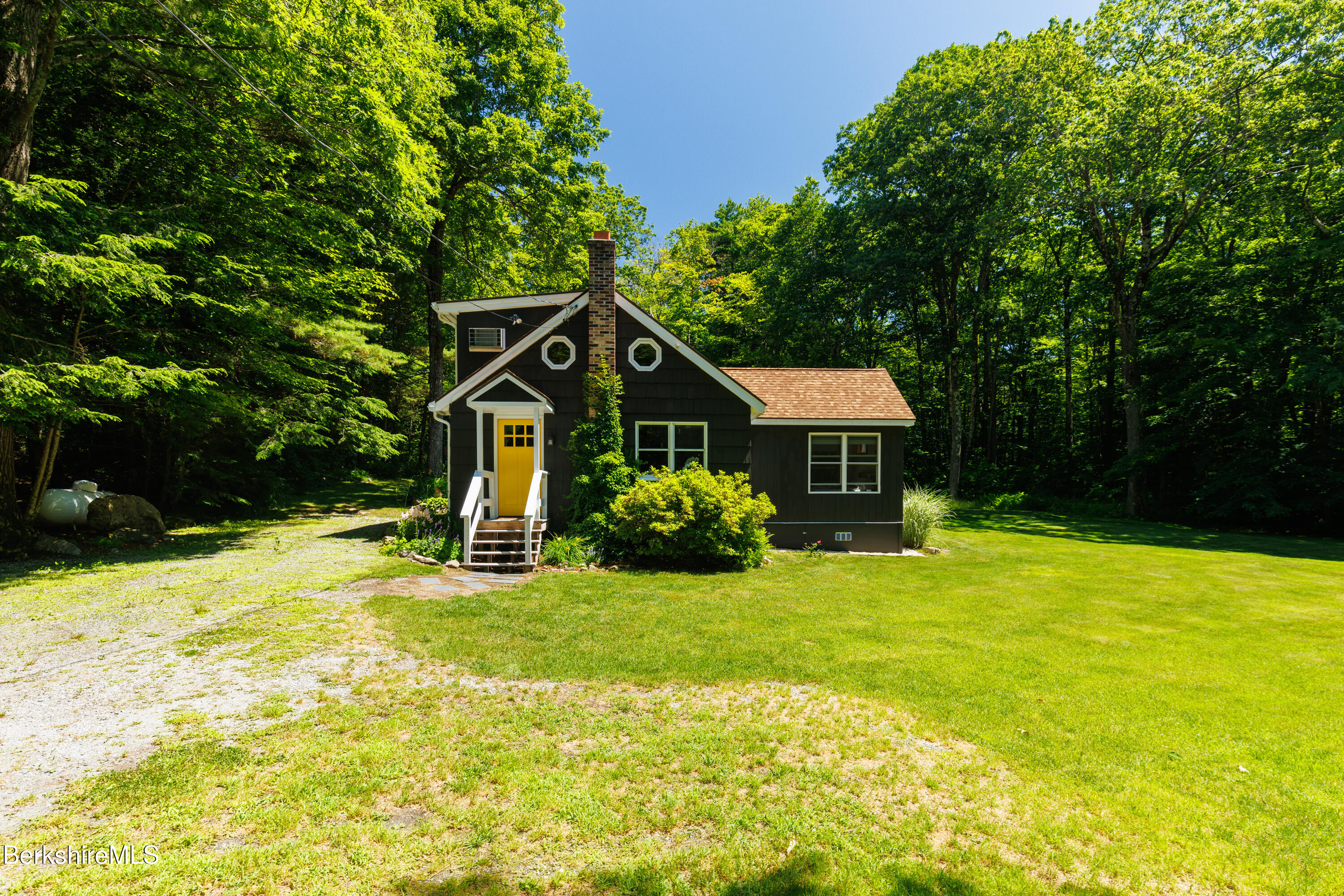 14 Norwalk Acres Road Monterey, MA 01245 - Photo 7 of 56 a house view with a outdoor space