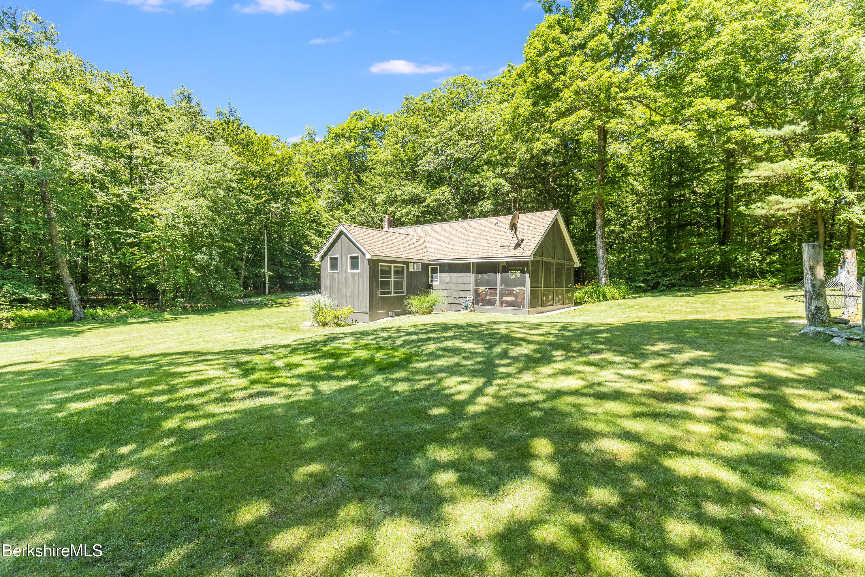 14 Norwalk Acres Road Monterey, MA 01245 - Photo 8 of 56 a house view with a garden space