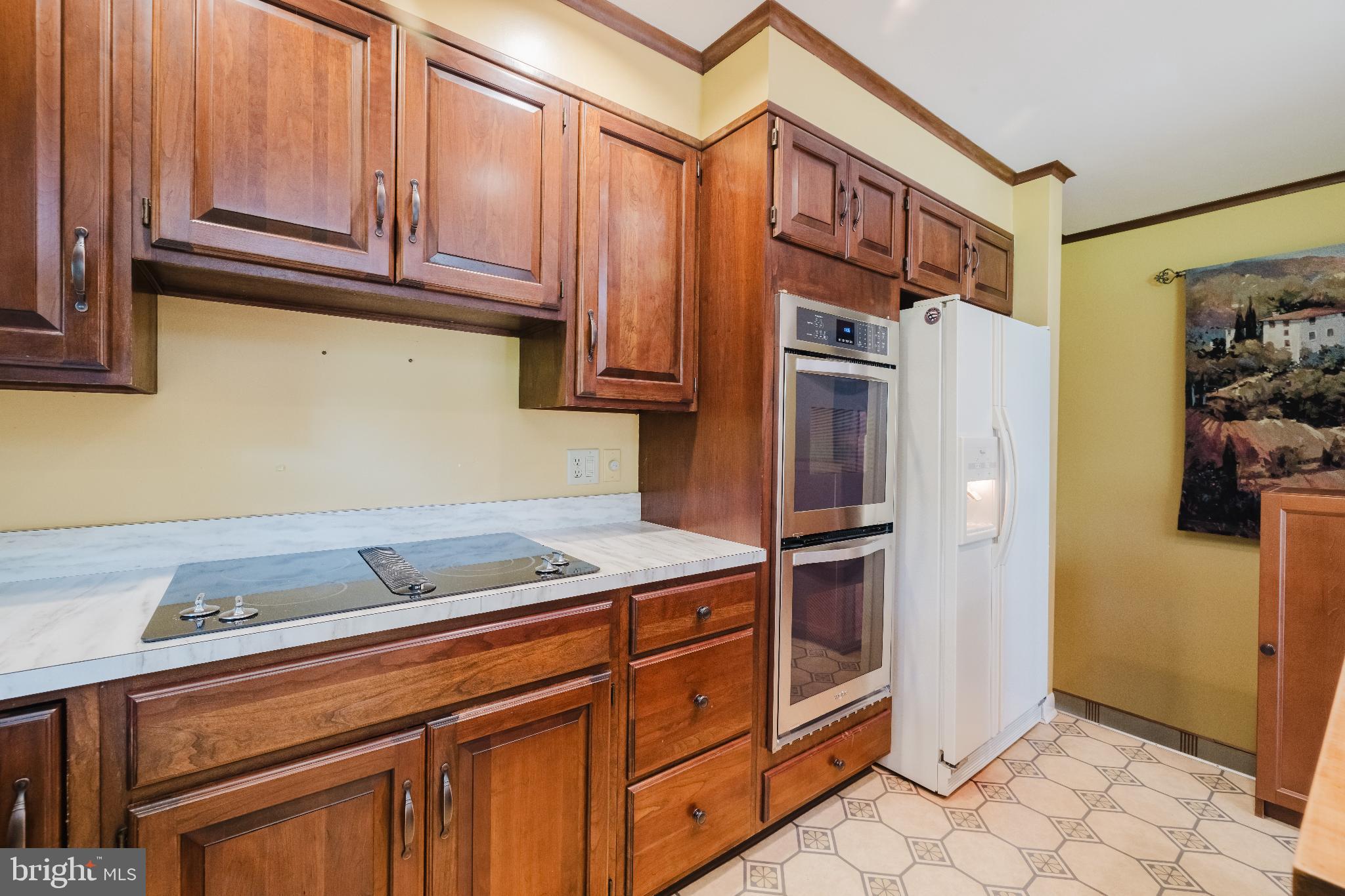 814 West Padonia Road Cockeysville, MD 21030 - Photo 11 of 28 a kitchen with stainless steel appliances granite countertop a refrigerator and a sink