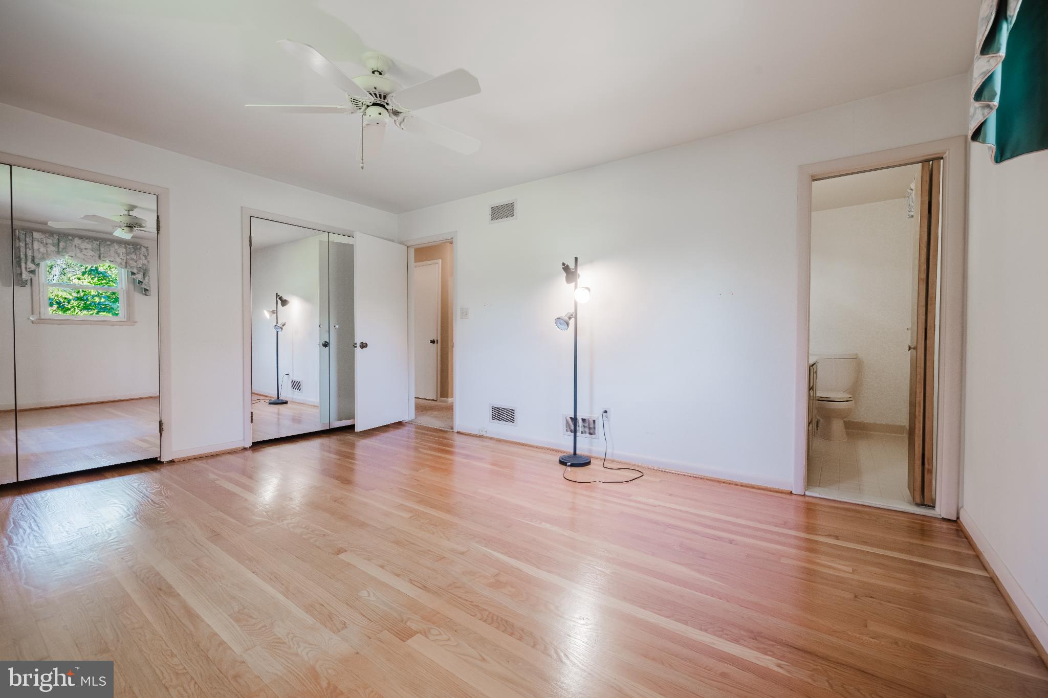 814 West Padonia Road Cockeysville, MD 21030 - Photo 12 of 28 a view of a room with wooden floor and potted plant