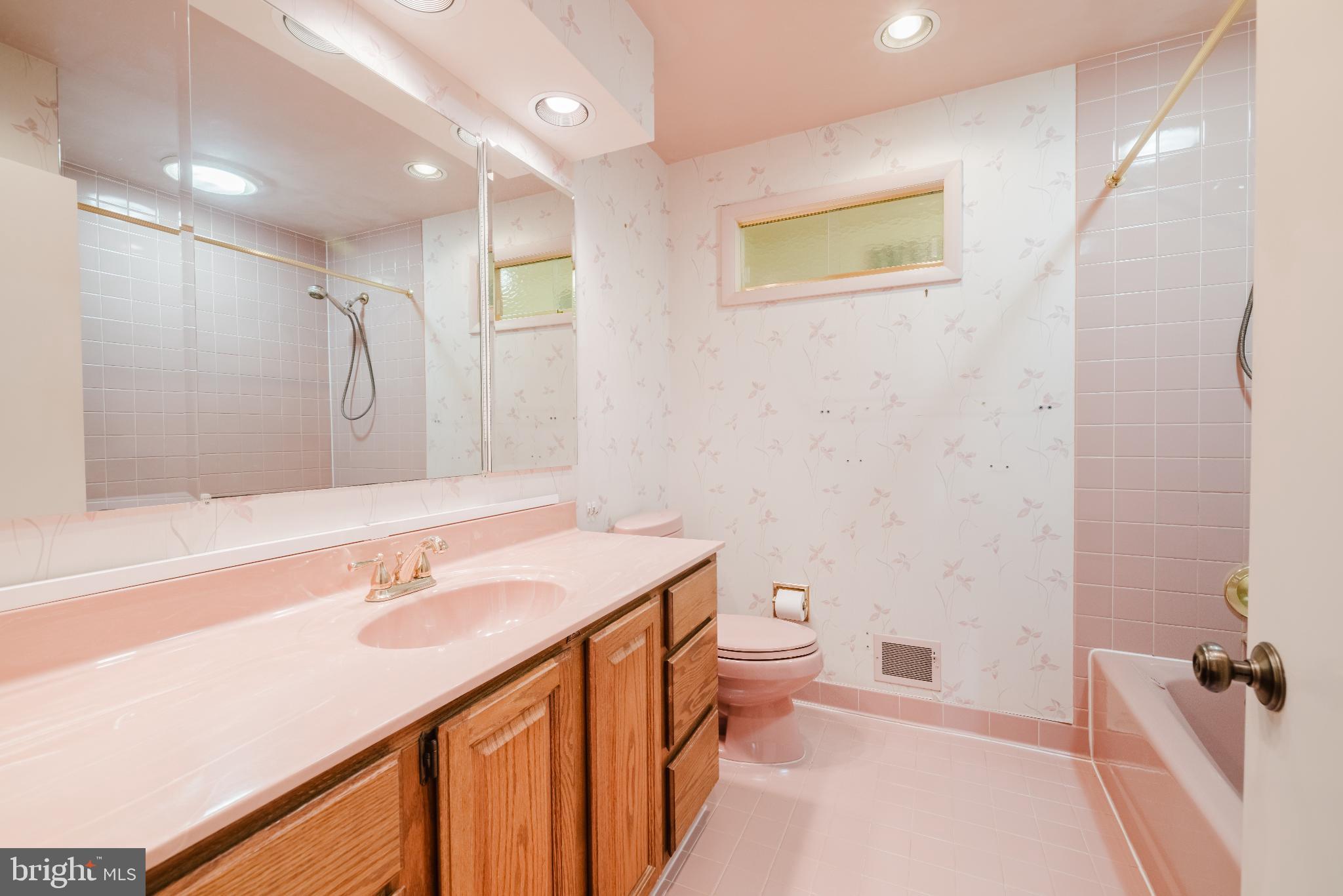 814 West Padonia Road Cockeysville, MD 21030 - Photo 16 of 28 a bathroom with a sink a toilet and shower