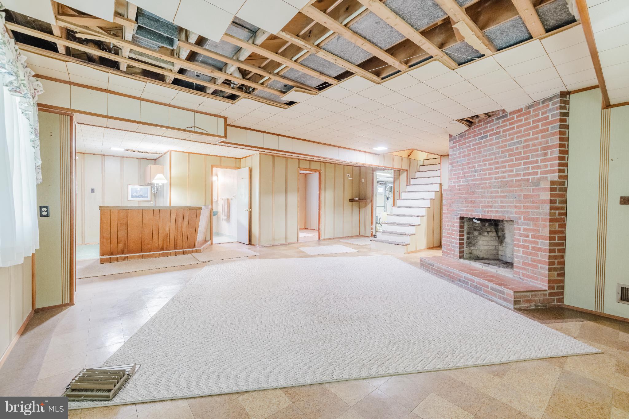 814 West Padonia Road Cockeysville, MD 21030 - Photo 17 of 28 a view of an empty room with a fireplace
