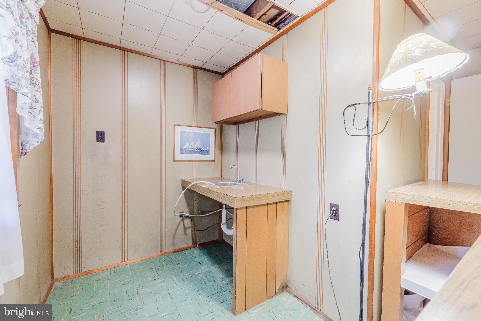 814 West Padonia Road Cockeysville, MD 21030 - Photo 19 of 28 a view of a kitchen from a hallway