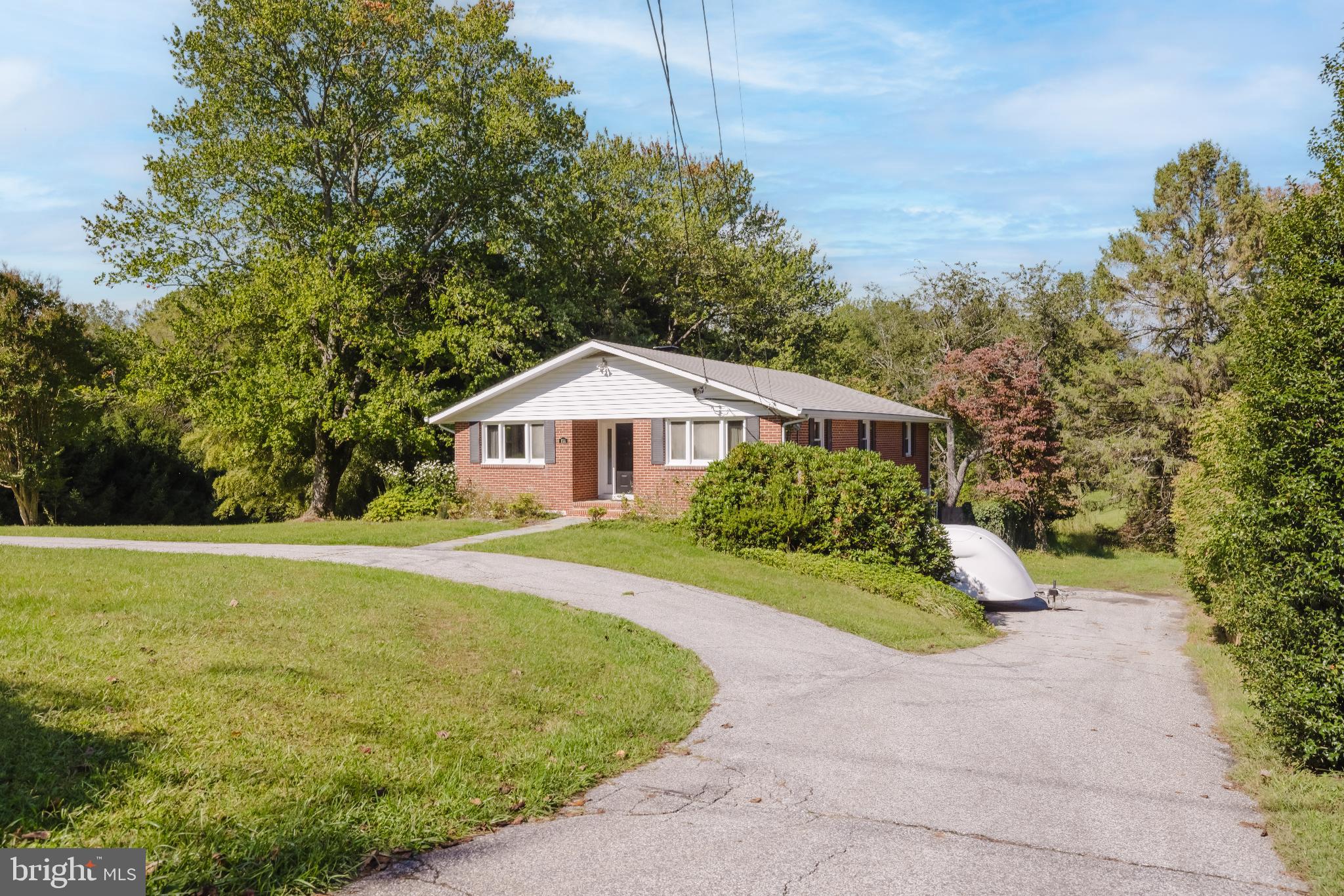 814 West Padonia Road Cockeysville, MD 21030 - Photo 26 of 28 a front view of a house with garden