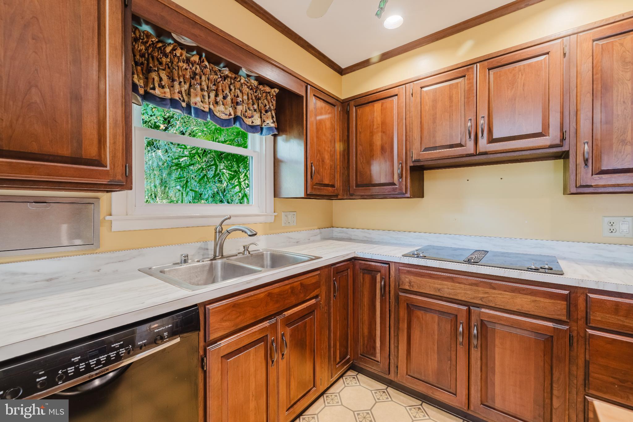 814 West Padonia Road Cockeysville, MD 21030 - Photo 10 of 28 a kitchen with stainless steel appliances granite countertop a sink stove and cabinets