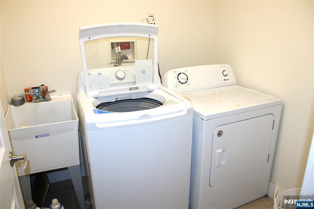 294-296 Tenafly Road Tenafly, NJ 07670 - Photo 24 of 24 a utility room with dryer and washer