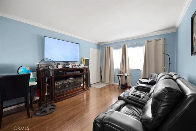 a kitchen with granite countertop a sink appliances and cabinets