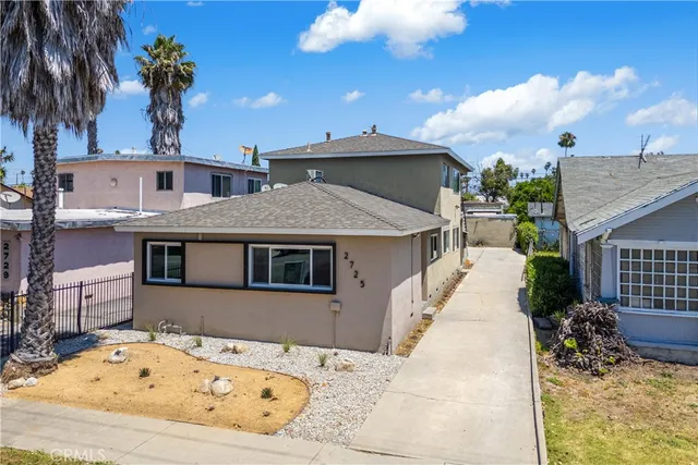 a view of a house with a patio