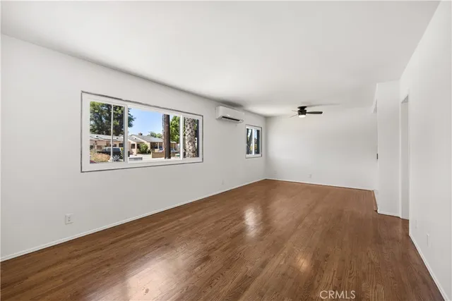 a view of a kitchen with a sink and a stove top oven