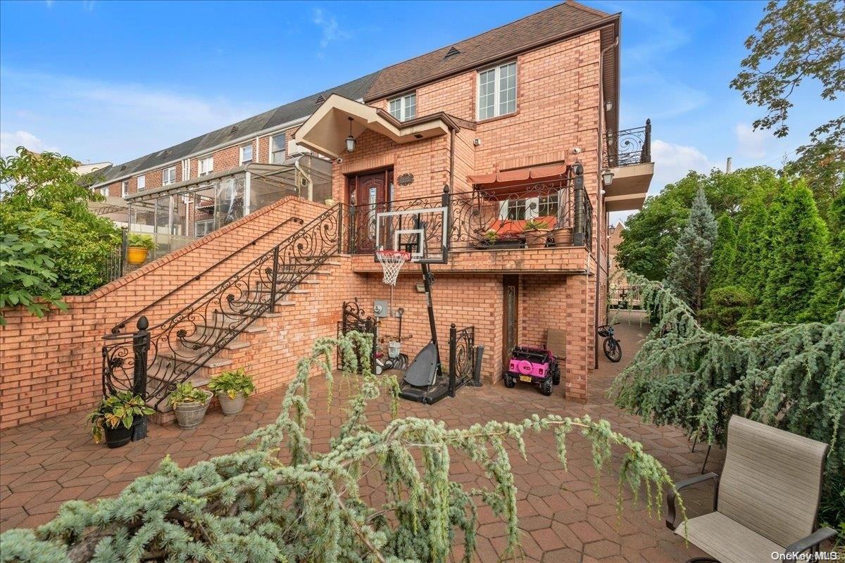 153-02 77th Avenue Queens, NY 11367 - Photo 22 of 23 a view of a building with many windows