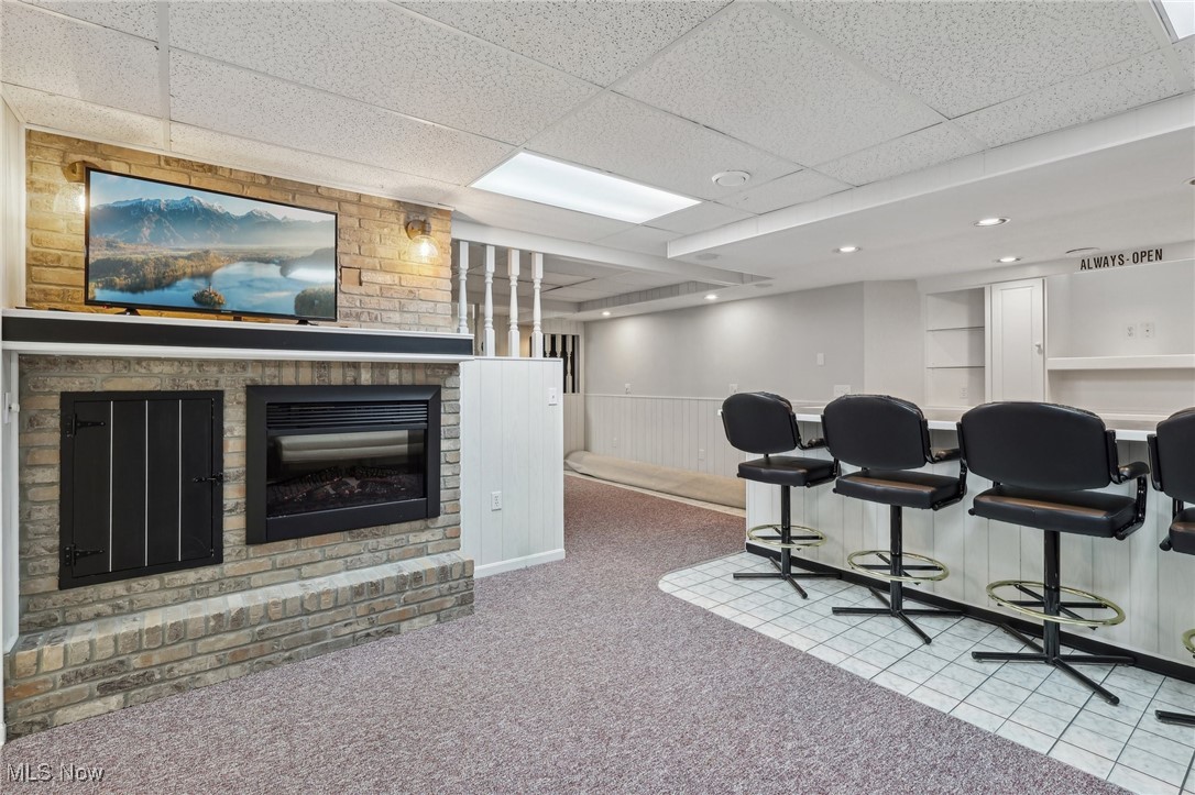 1881 Center Road Avon, OH 44011 - Photo 35 of 50 Basement family room w/electric fireplace.