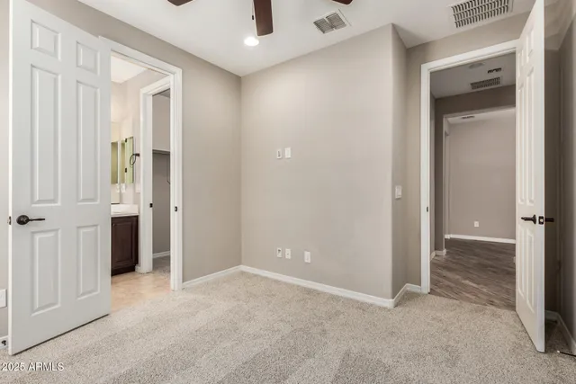 an empty room and closet area