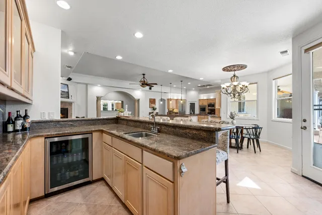 a kitchen with a stove and cabinets
