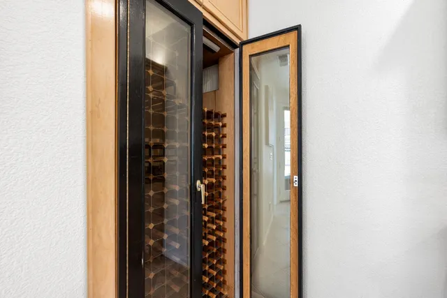 a view of a bathroom from a hallway