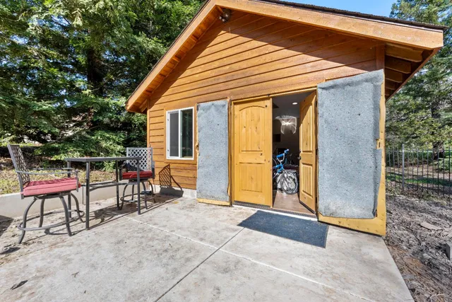 an outdoor view of house with outdoor seating