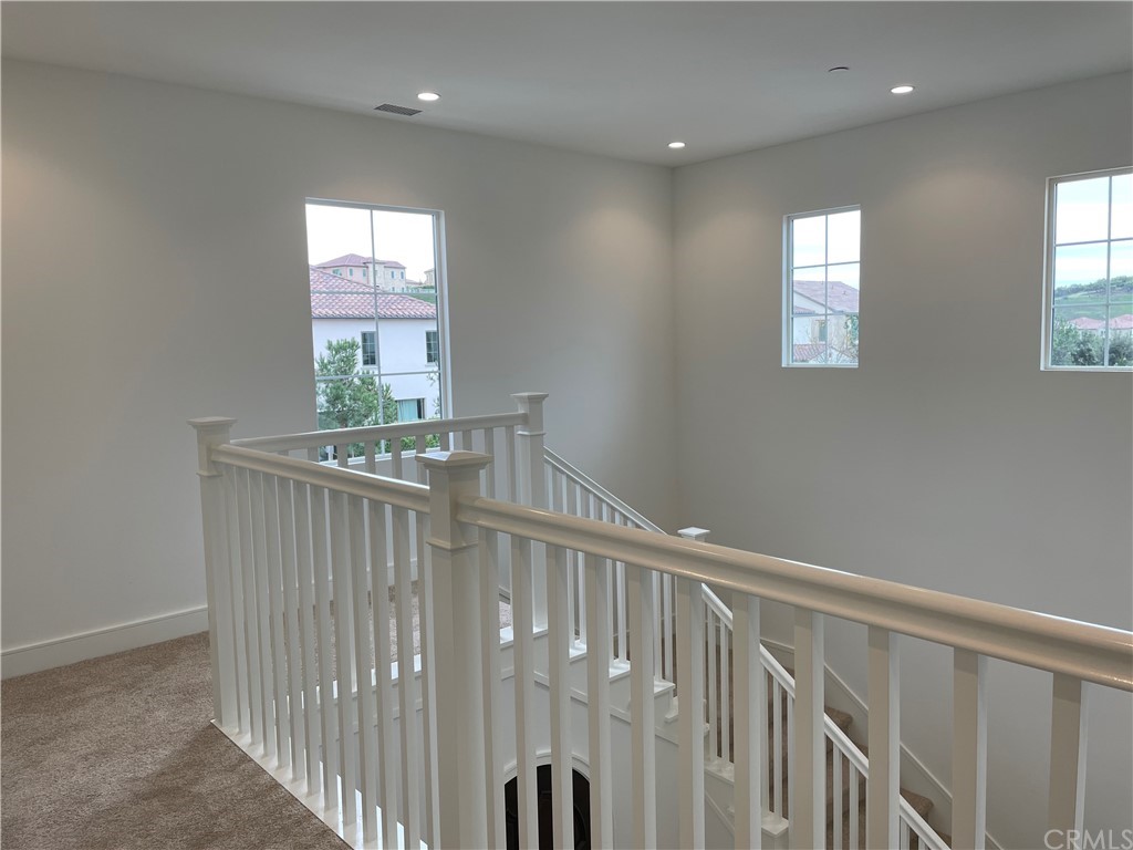 191 Oceano Irvine, CA 92602 - Photo 8 of 11 a view of staircase with white floor and a window