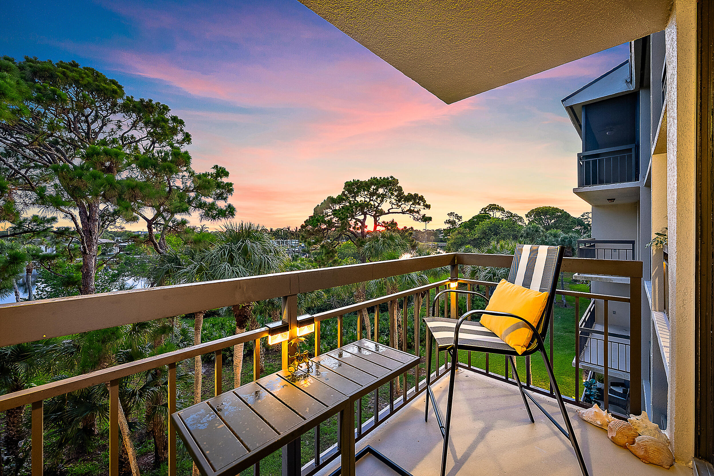 2101 Marina Isle Way, Unit 404 Jupiter, FL 33477 - Photo 19 of 29 Sunset Balcony