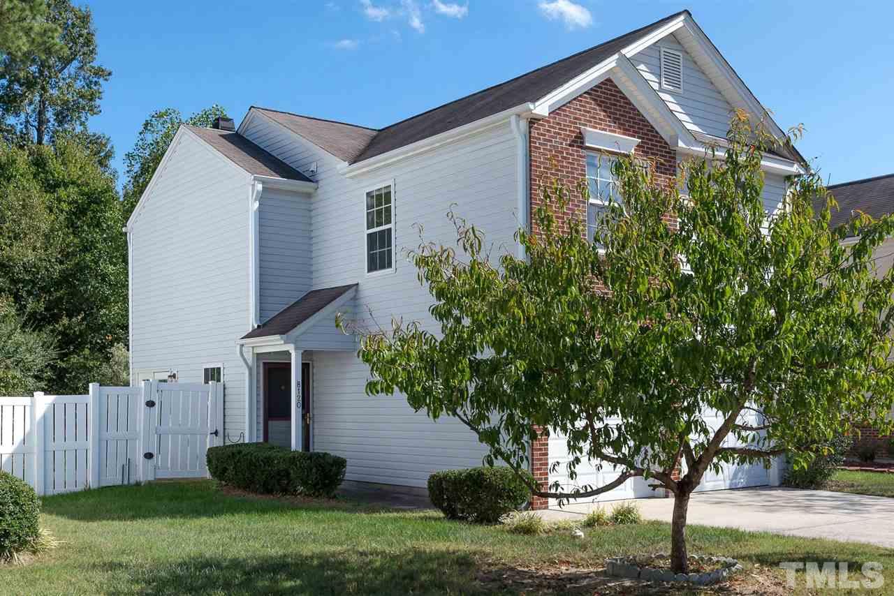 8120 Tara Ridge Road Raleigh, NC 27616 - Photo 2 of 22 a front view of house with yard and green space