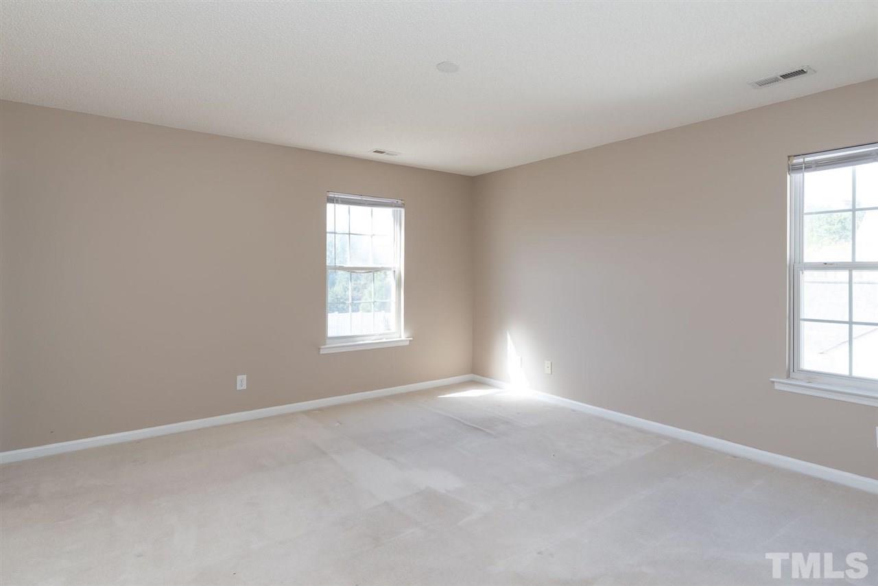 8120 Tara Ridge Road Raleigh, NC 27616 - Photo 16 of 22 an empty room with windows
