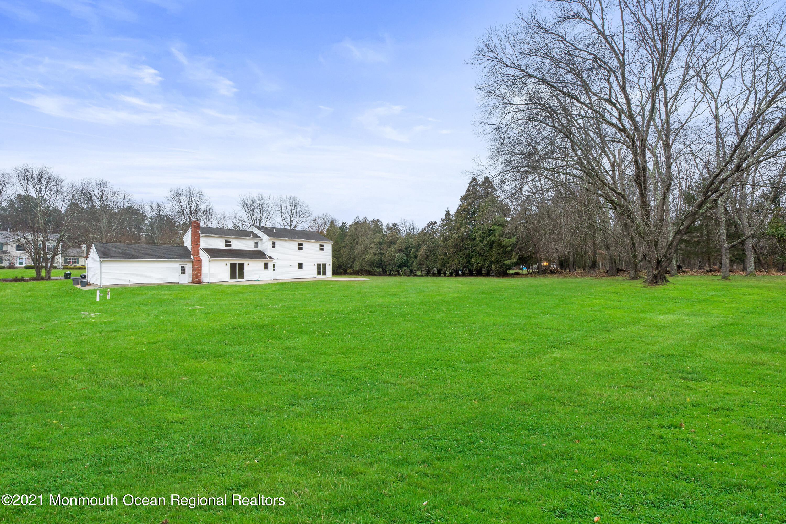 26 Squan Road Millstone Township, NJ 08510 - Photo 2 of 24 a view of field with trees in the background