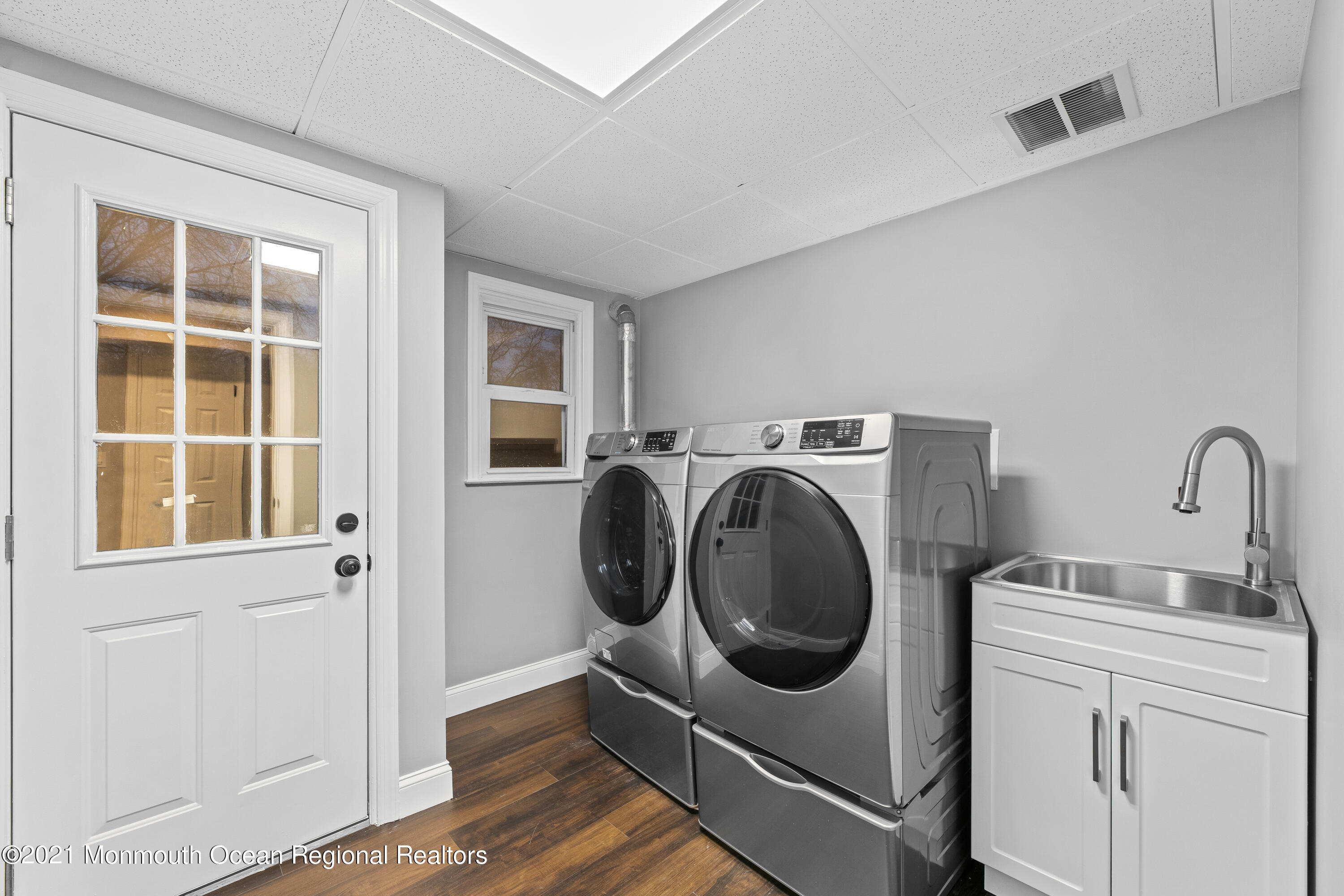 26 Squan Road Millstone Township, NJ 08510 - Photo 15 of 24 a utility room with dryer and washer