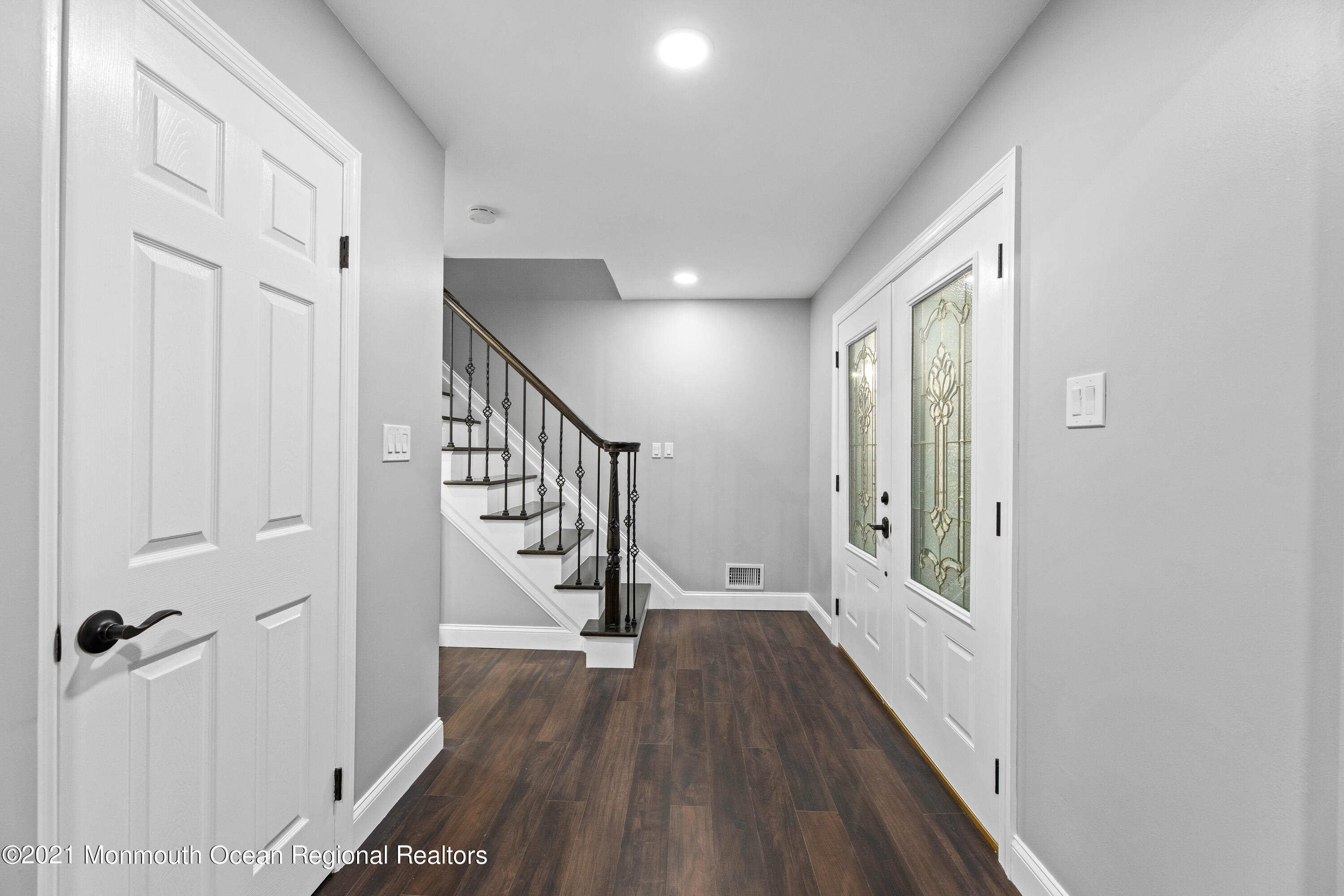 26 Squan Road Millstone Township, NJ 08510 - Photo 3 of 24 a view of entryway with wooden floor
