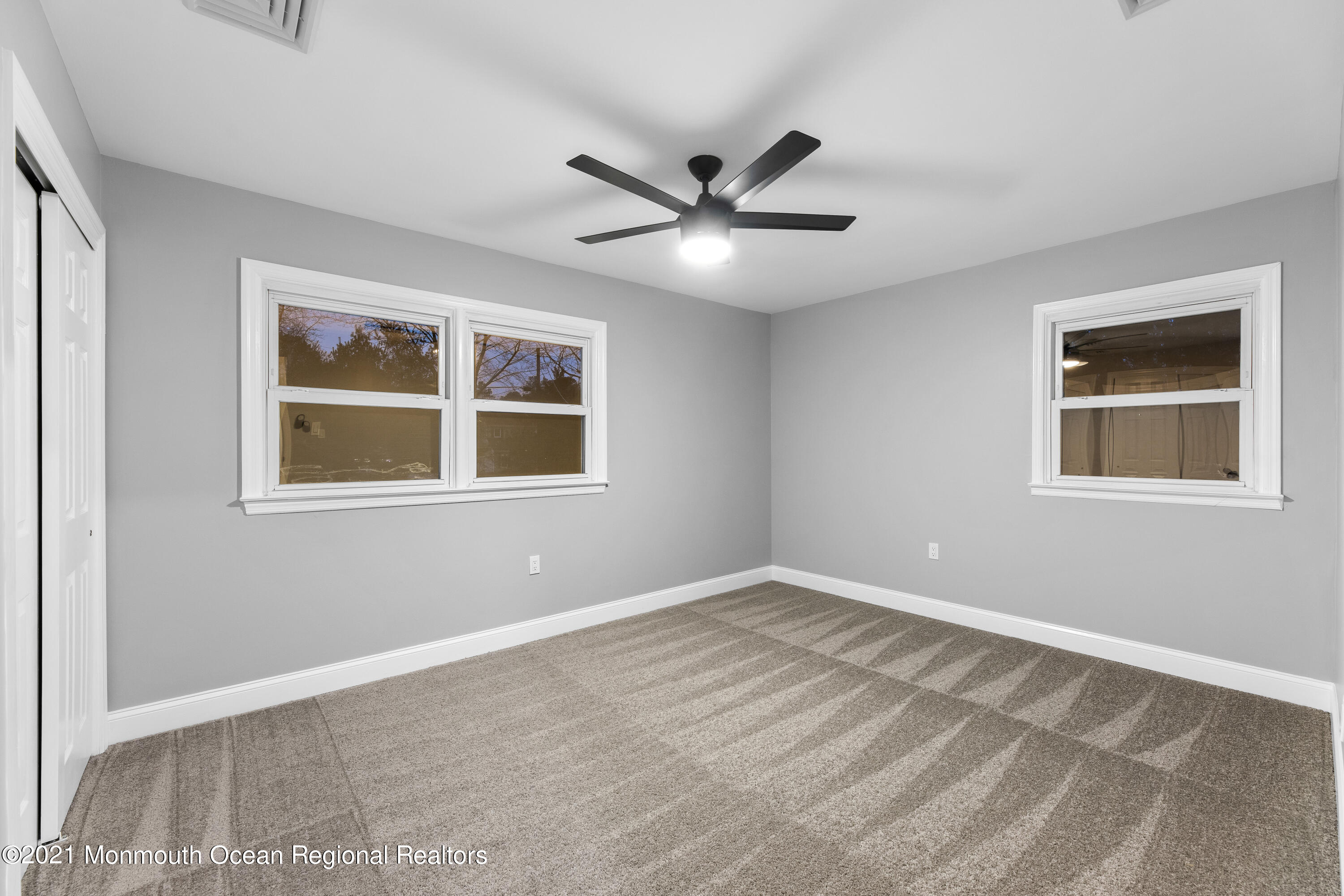 26 Squan Road Millstone Township, NJ 08510 - Photo 24 of 24 a view of empty room with window and ceiling fan