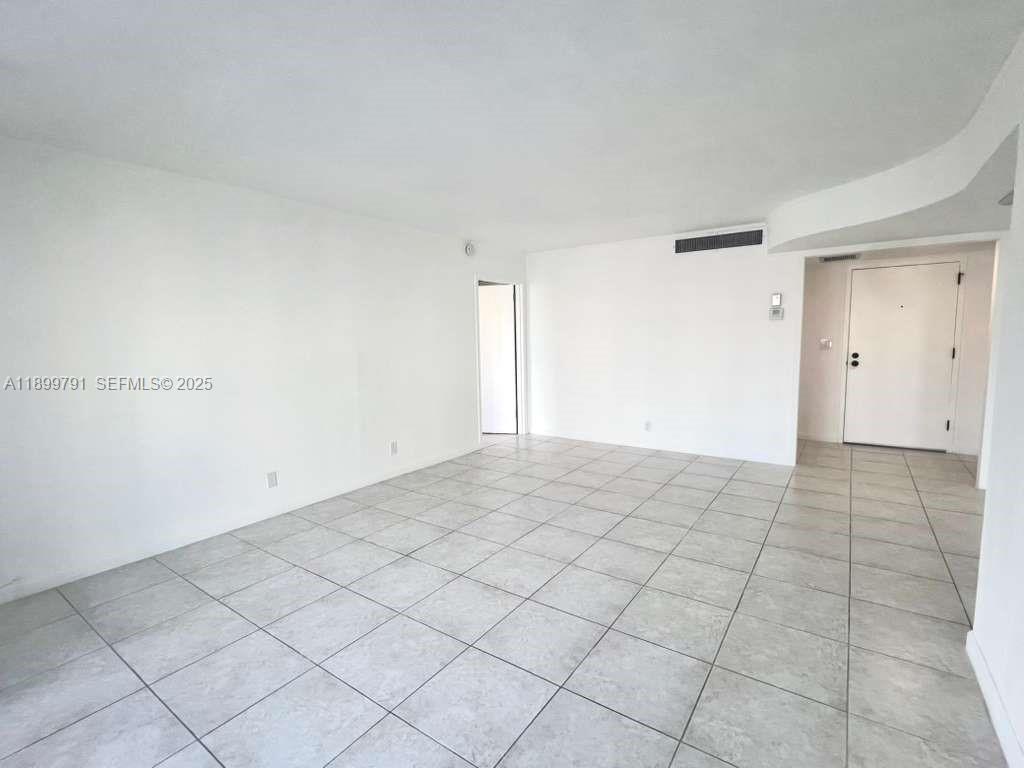100 Golden Isles Drive, Unit 406 Hallandale Beach, FL 33009 - Photo 14 of 31 a view of empty room