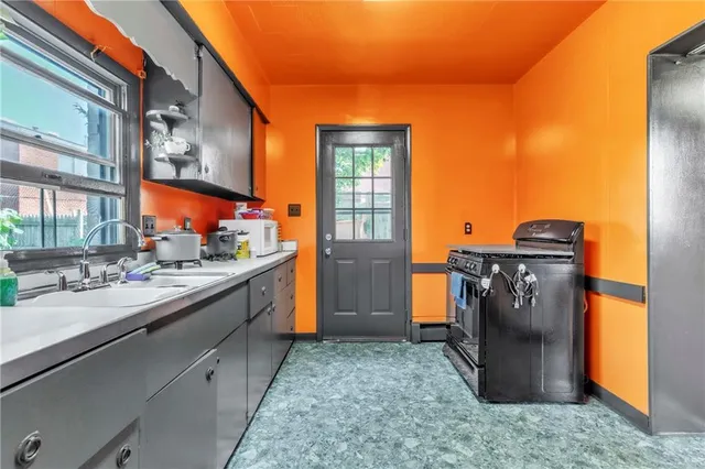 a view of a kitchen with a window