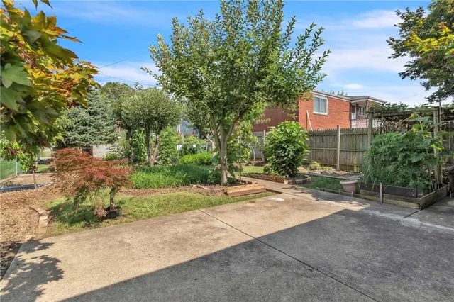 a house view with a garden space