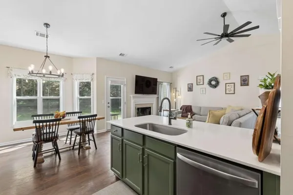 a view of a dining room with furniture window and outside view