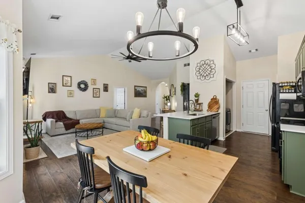 a view of a dining room with furniture