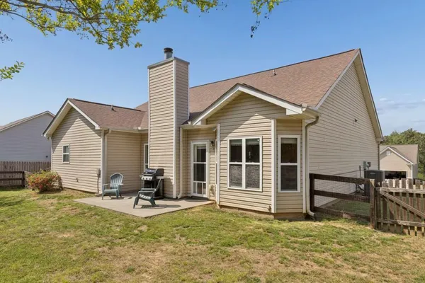 a view of a house with a patio