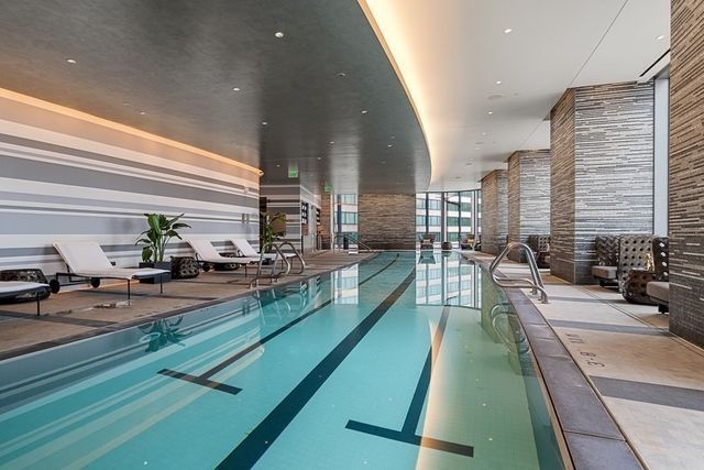 a very nice looking room with lots of chairs and furniture