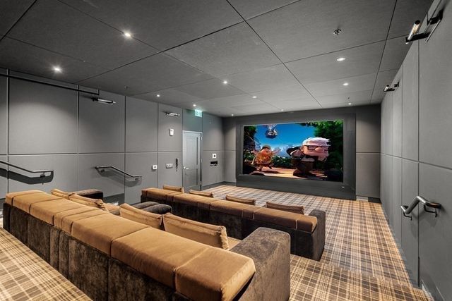 a bedroom with furniture and a mirror