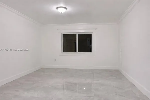 an empty room with a window